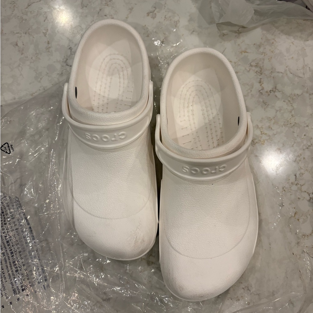 Like new White CROCS size 12 closed toe Clogs shoes sandals with Strap